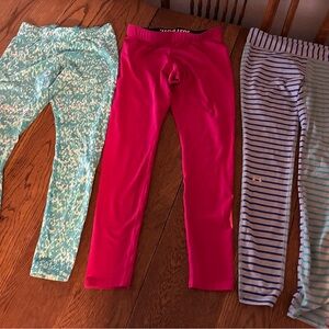 Under Armour & 2 Nike women’s Leggings Trio - Teal, Pink, Striped, junior medium